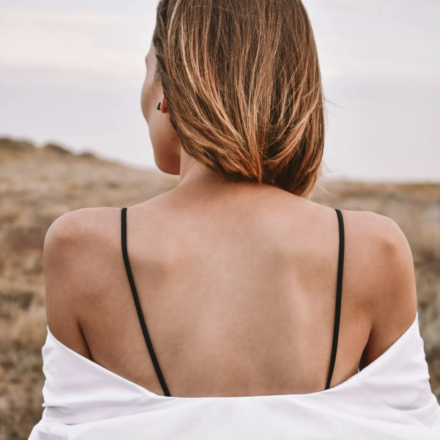 Woman showing her smooth back and shoulders