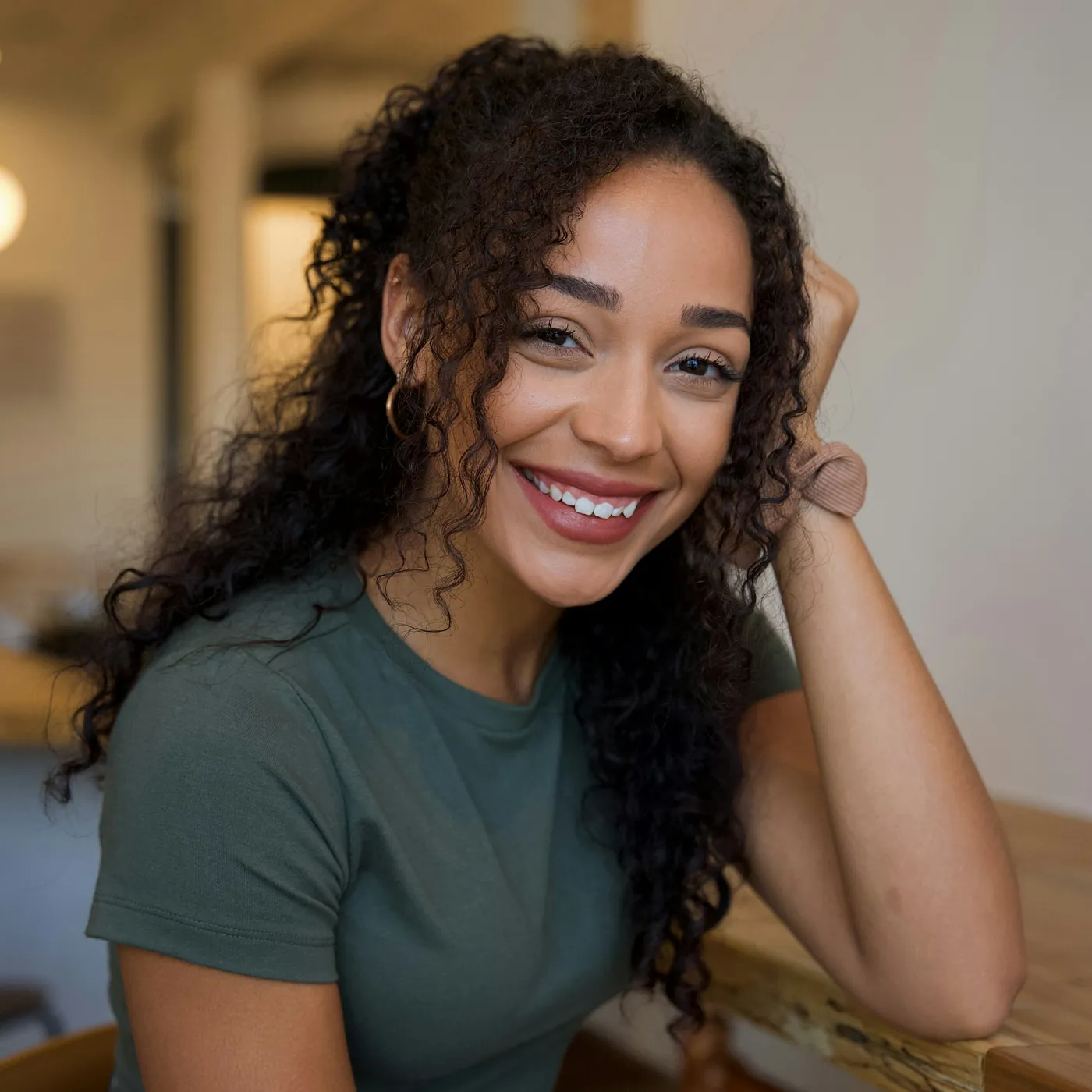 Smiling woman with curly hair